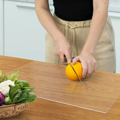 personne coupe orange sur planche ça découper transparente